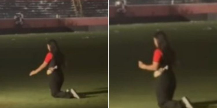 Torcedora do Vitória é flagrada atravessando o Barradão de joelhos após permanência na Série A